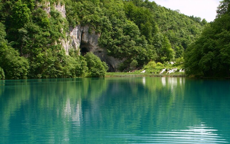 Turquoise Lake with Cave