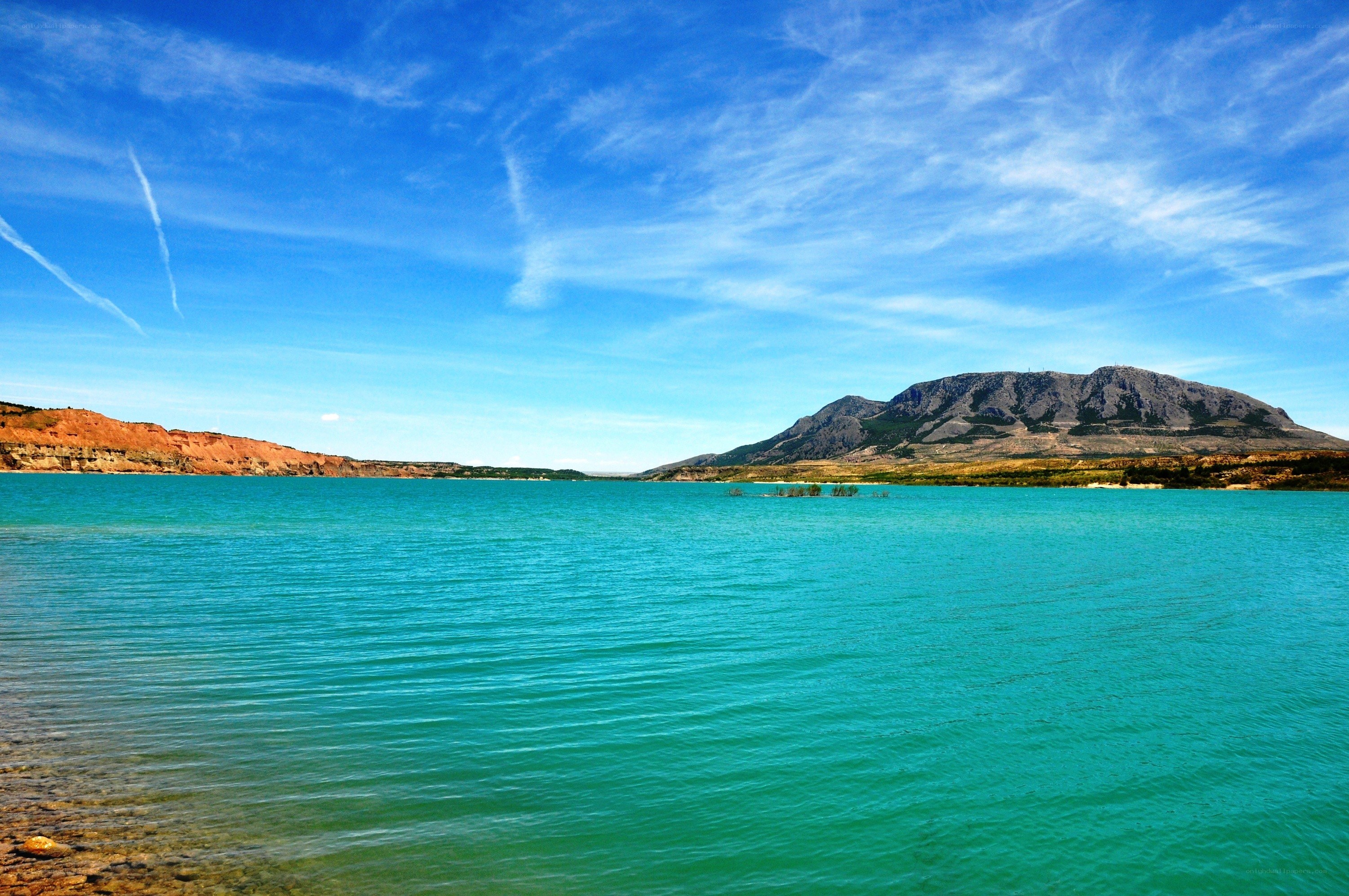 Turquoise lake with mountains
