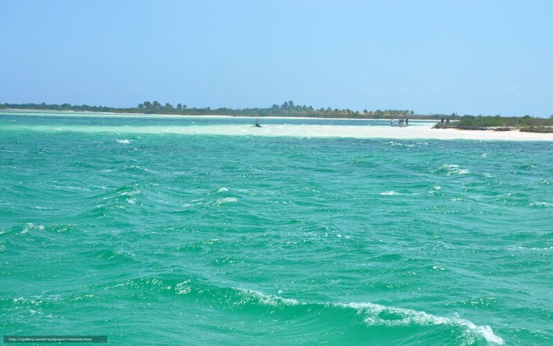 Turquoise ocean waves and sandbar