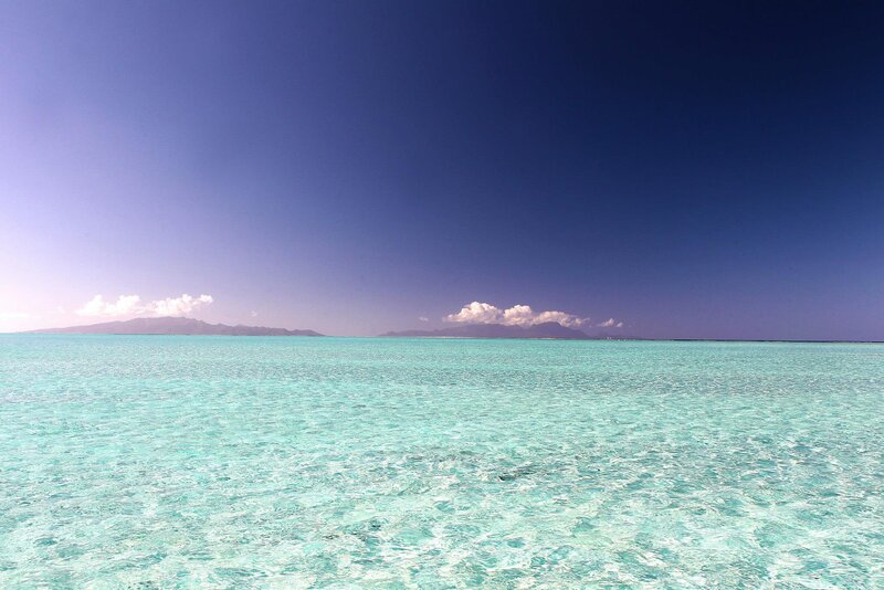 Turquoise Ocean with Distant Islands