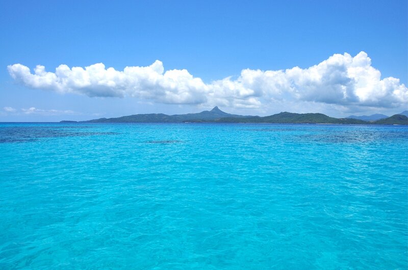 Turquoise Ocean with Island