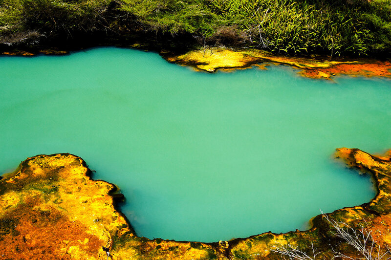 Turquoise pool with mineral deposits