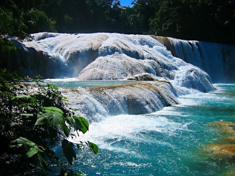 turquoise waterfall in forest