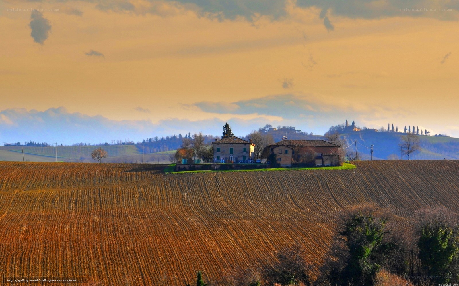 Tuscan countryside at sunset