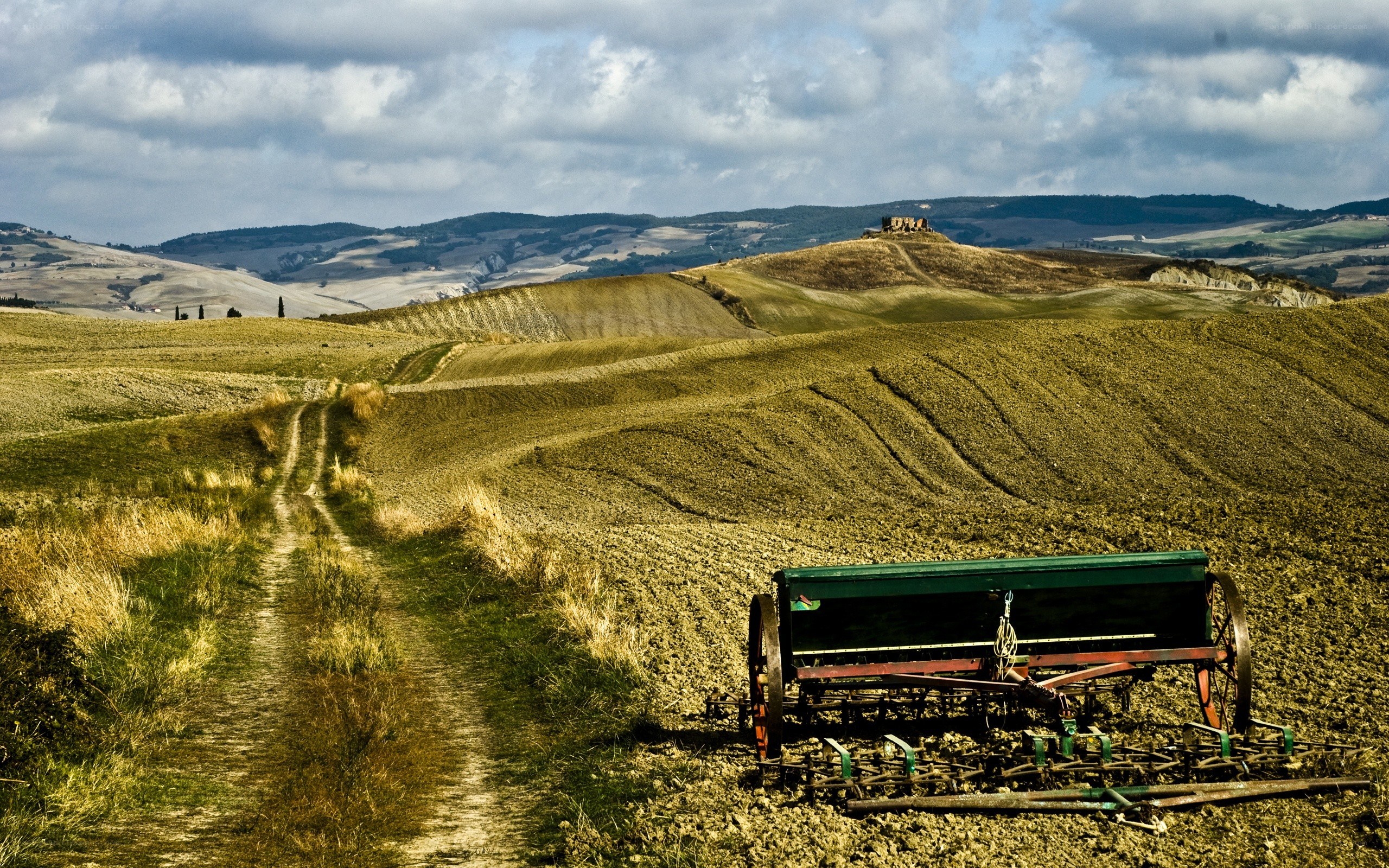 Tuscan countryside with farm equipment