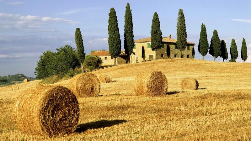 Tuscan countryside with hay bales