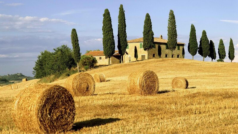 Tuscan countryside with hay bales