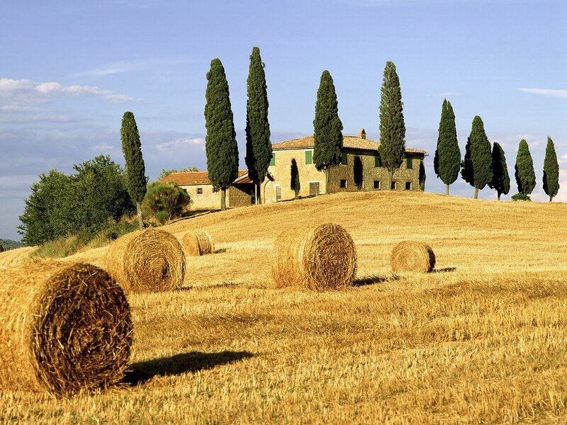 Tuscan countryside with hay bales
