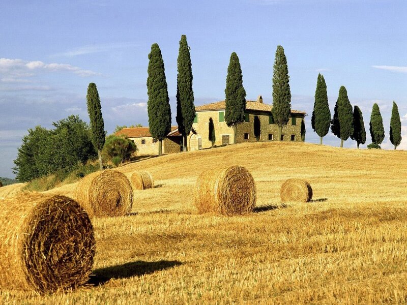 Tuscan countryside with hay bales