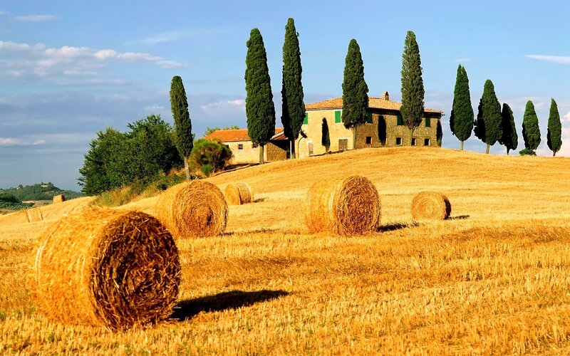 Tuscan countryside with hay bales
