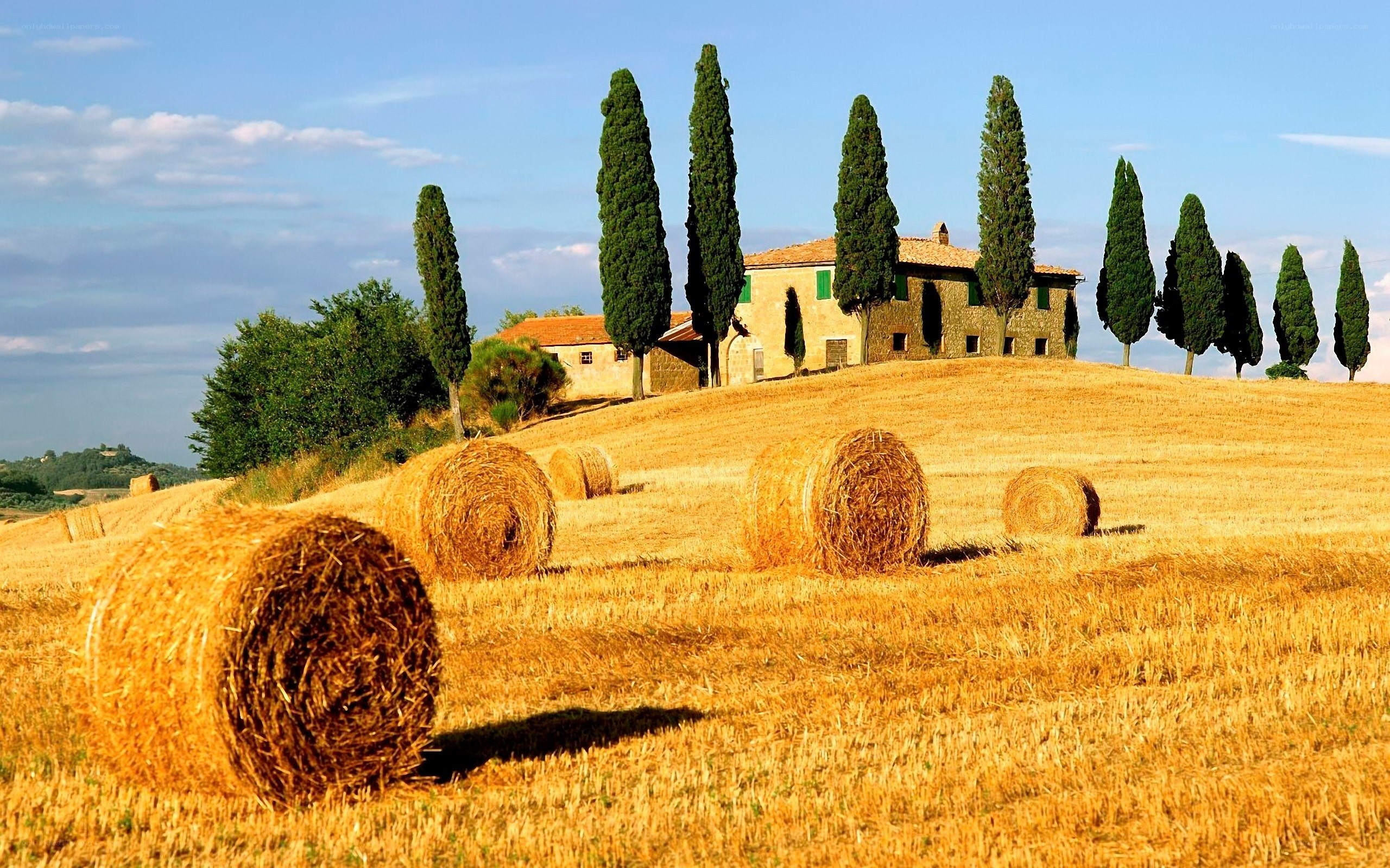 Tuscan countryside with hay bales