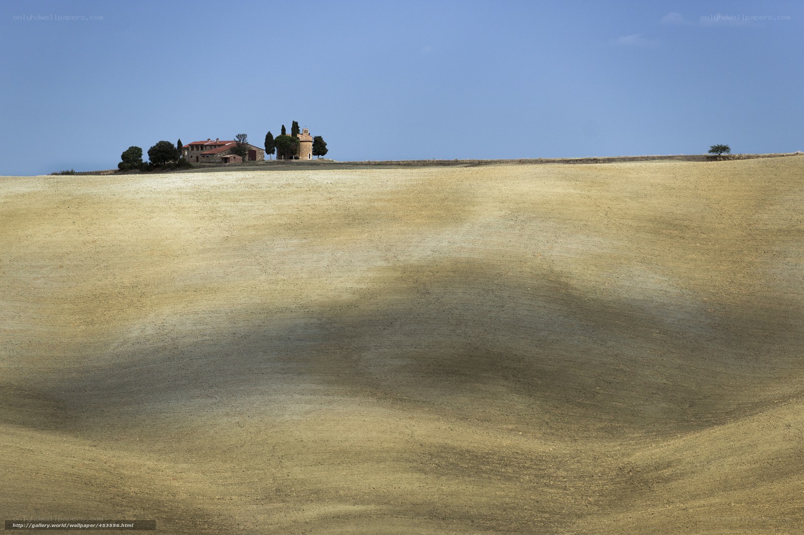Tuscan hillside with farmhouse