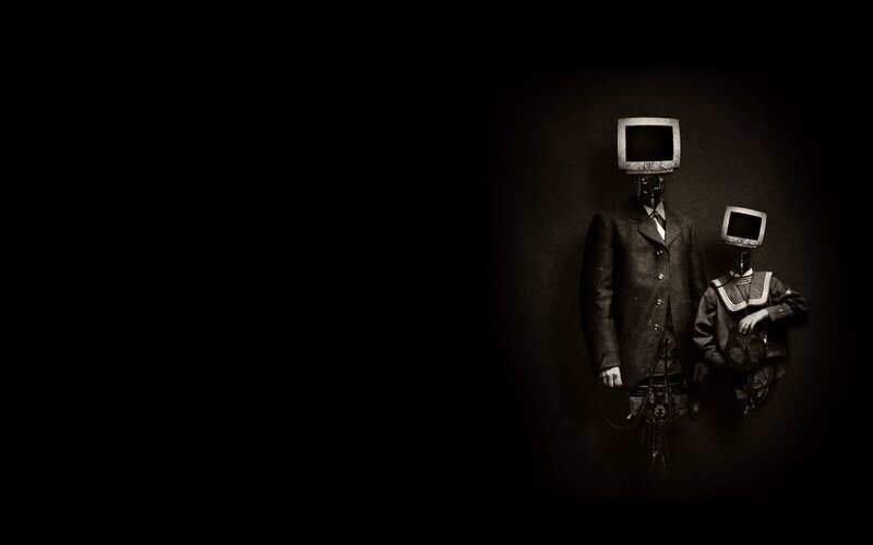 TV-headed figures in suits