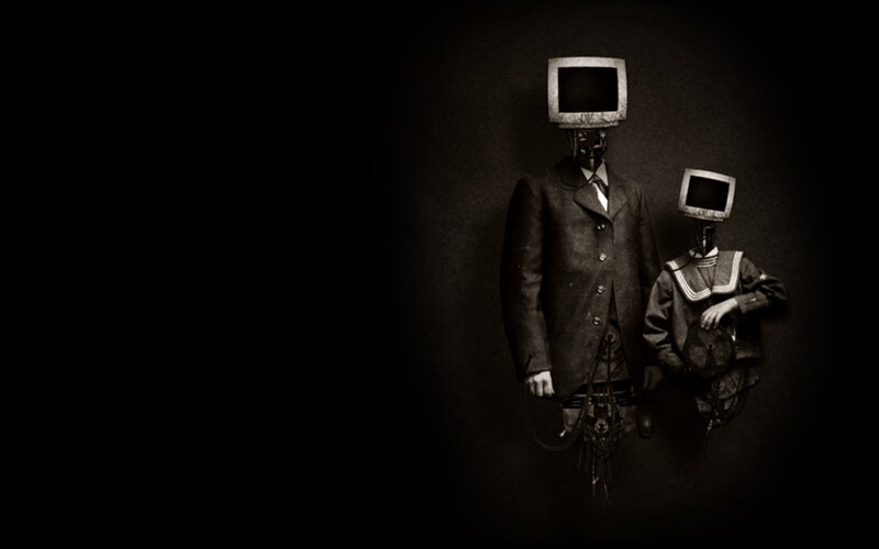 TV-headed figures in suits