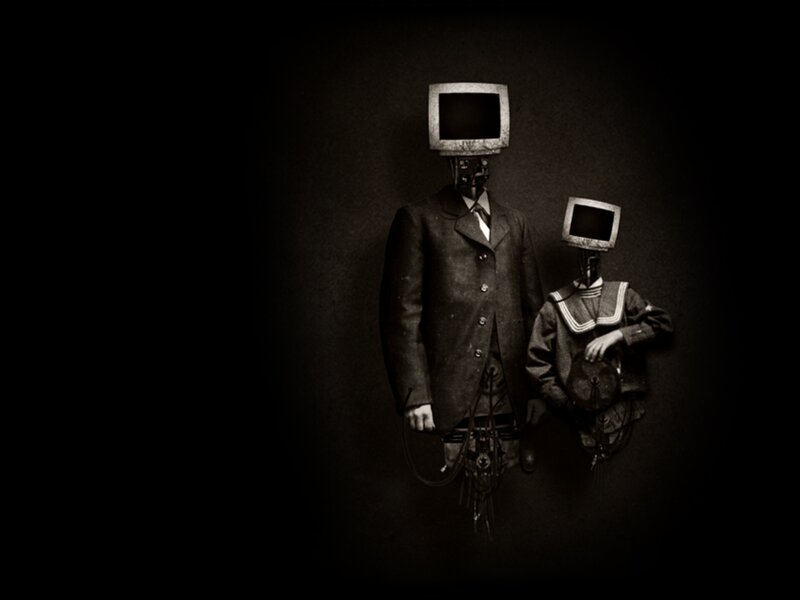 TV-headed figures in suits