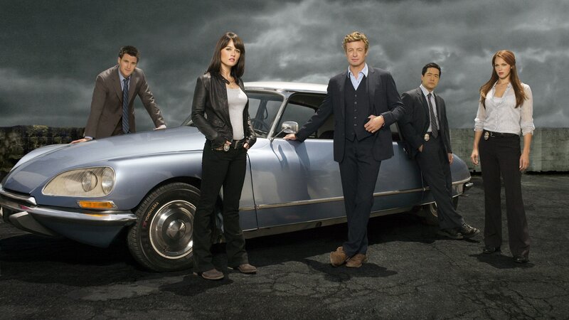 TV show cast with classic car