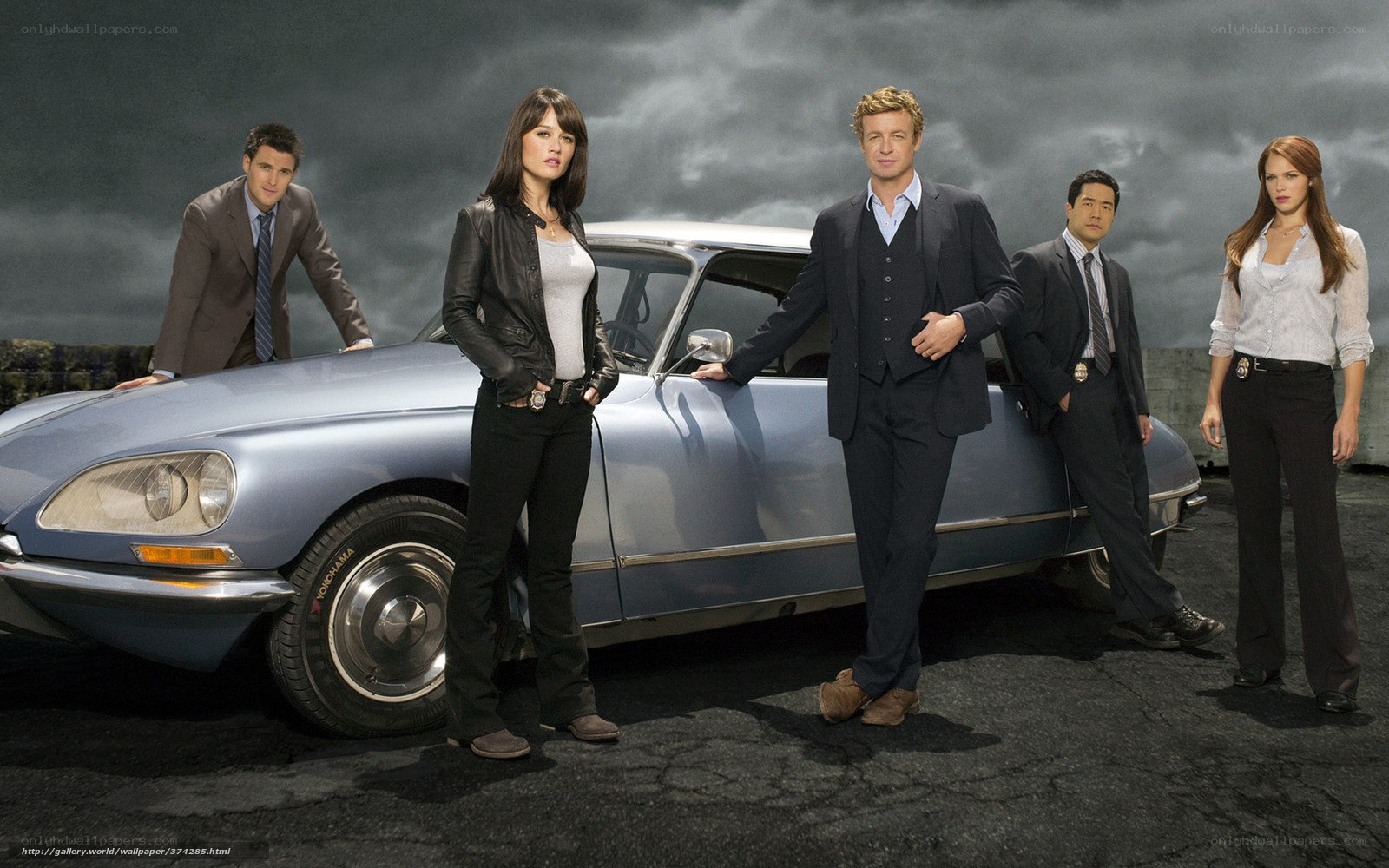 TV show cast with classic car