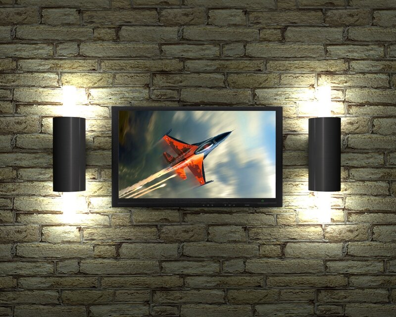 TV with fighter jet on brick wall