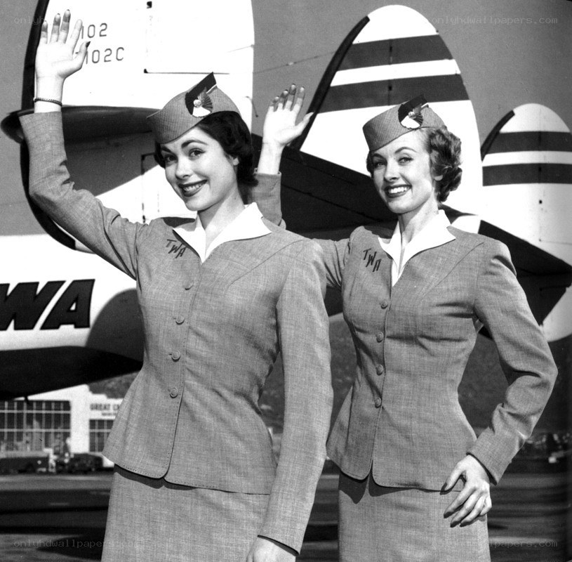 TWA flight attendants waving