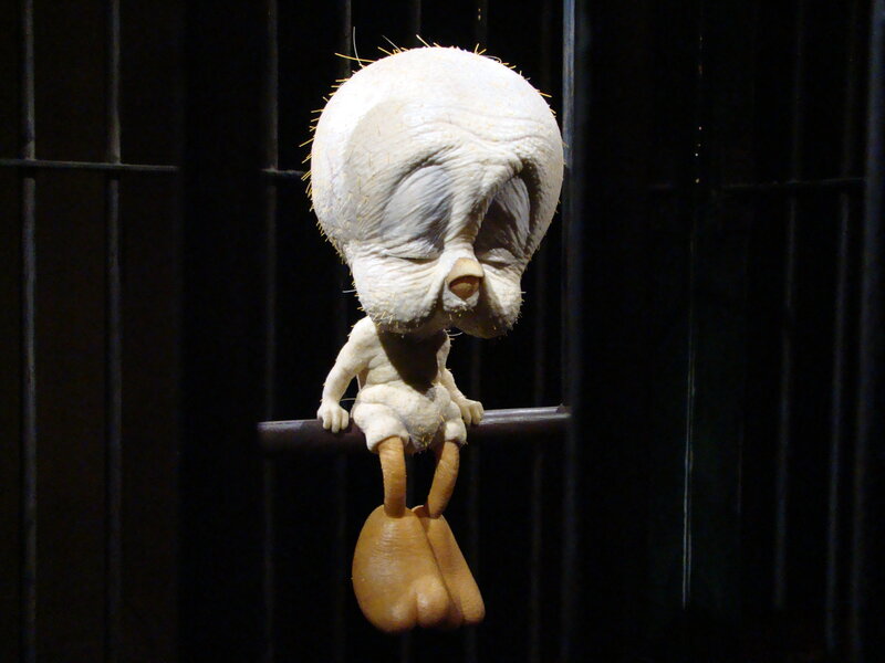 Tweety Bird sculpture in cage