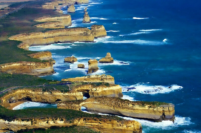 Twelve Apostles Rock Formations — Blue, Dramatic, Afternoon, Photograph, Ocean, Cliffs, Arches