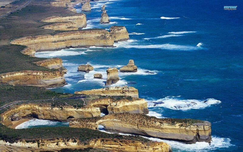 Twelve Apostles Rock Formations — Blue, Dramatic, Afternoon, Photograph, Ocean, Cliffs, Road