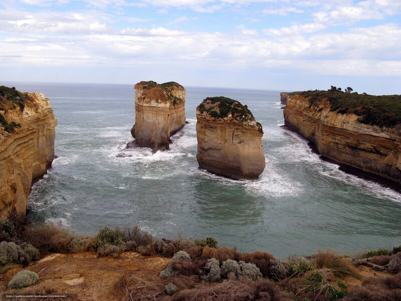 Twelve Apostles Rock Formations — Blue, Serene, Afternoon, Photograph, Ocean, Cliffs, Vegetation