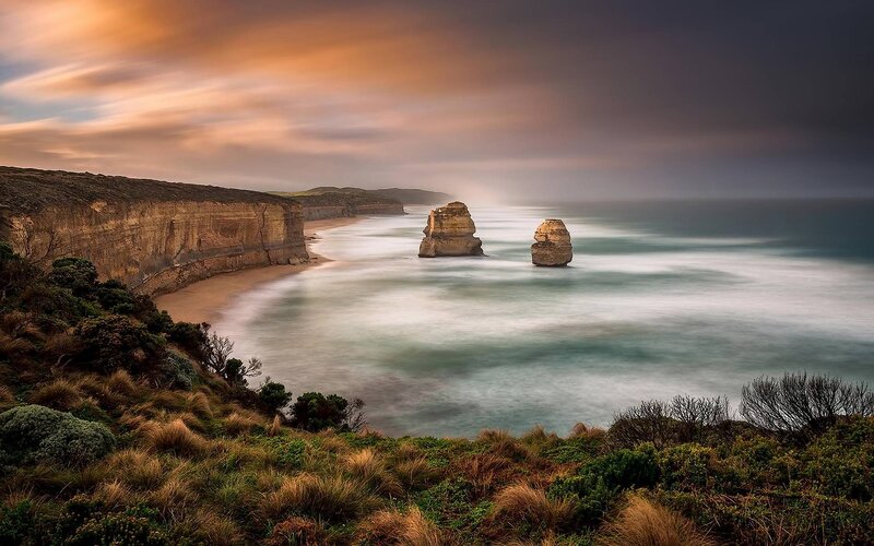 Twelve Apostles Rock Formations — Orange, Dramatic, Sunset, Photograph, Cliffs