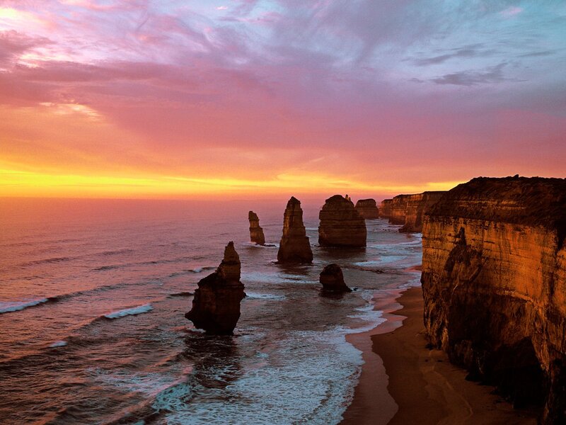 Twelve Apostles Rock Formations — Orange, Dramatic, Sunset, Photograph, Ocean