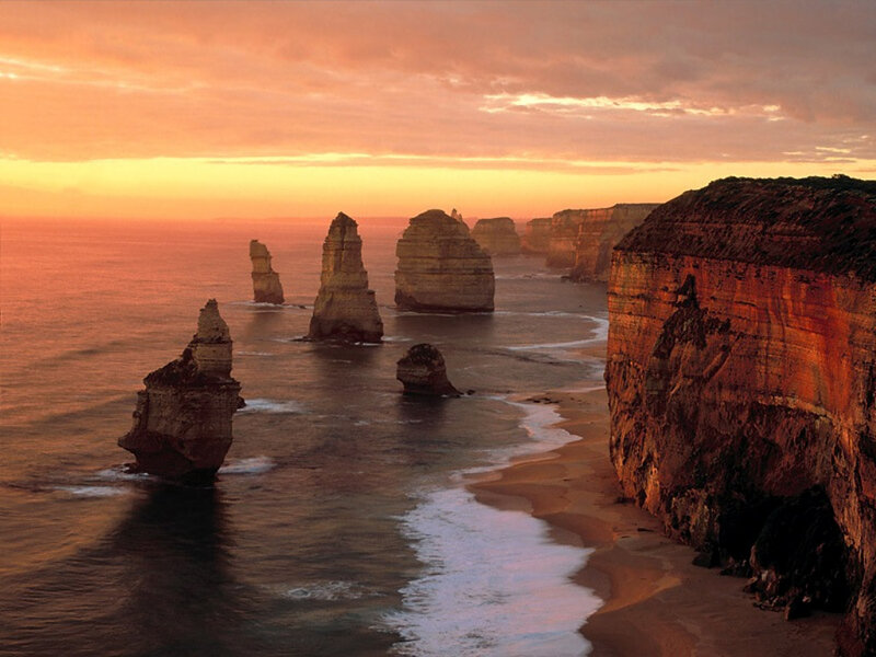Twelve Apostles Rock Formations — Orange, Dramatic