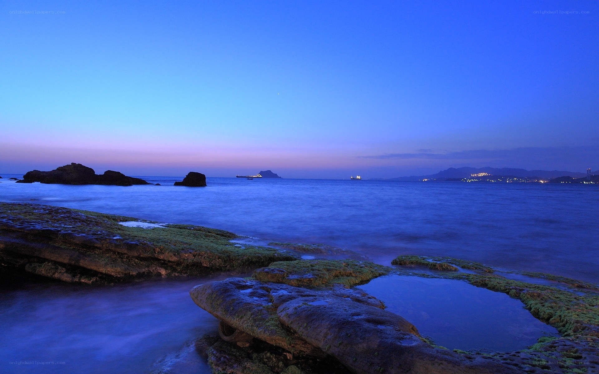 Twilight at the rocky coast