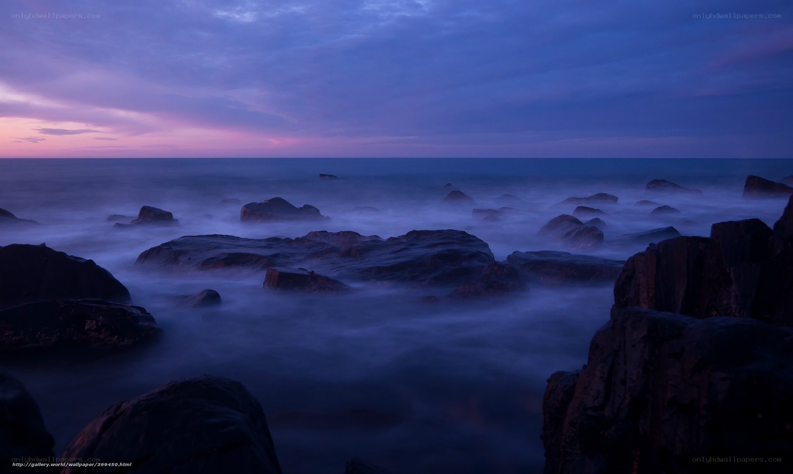 Twilight at the rocky shore