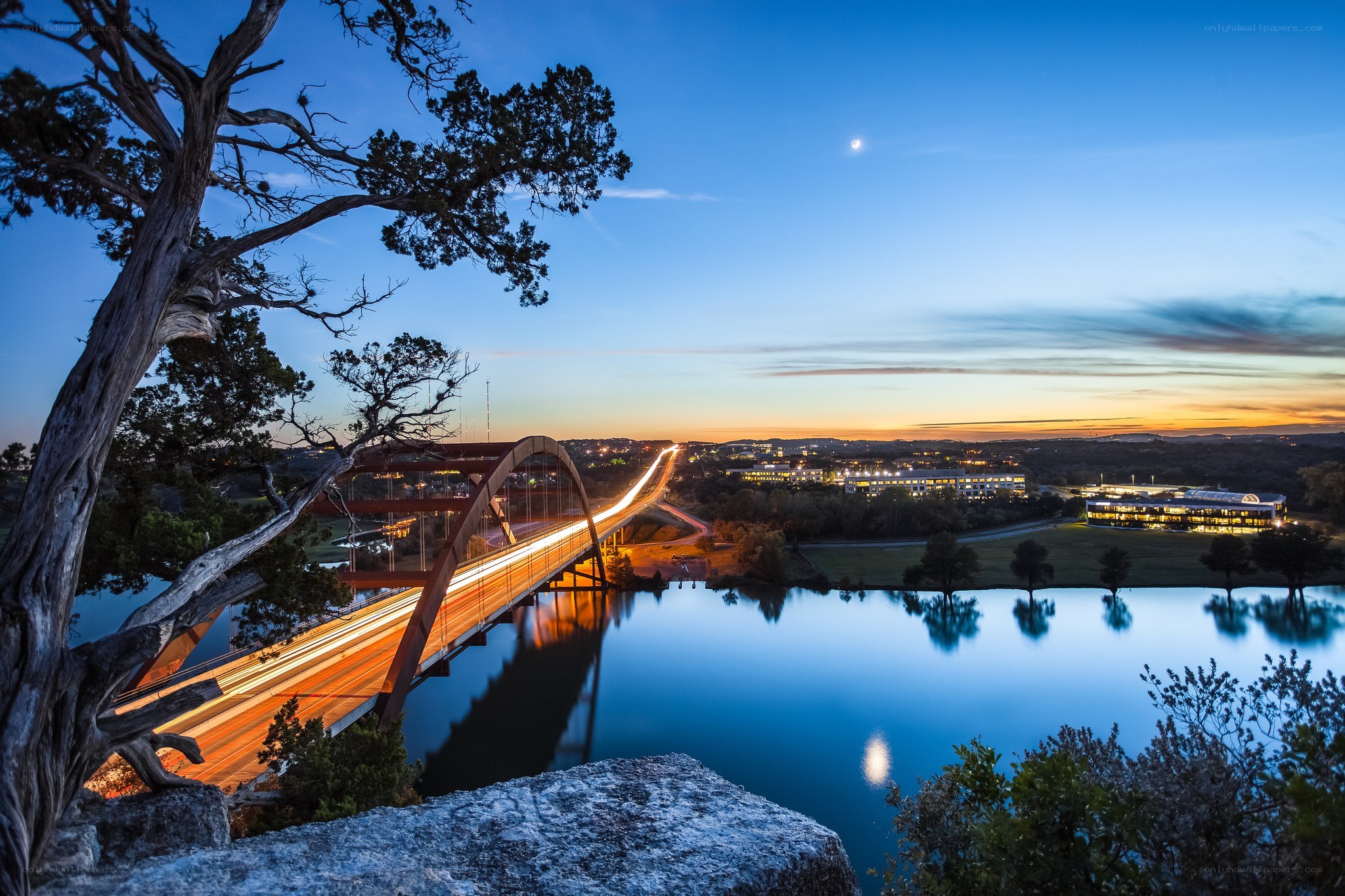 Twilight bridge over a lake