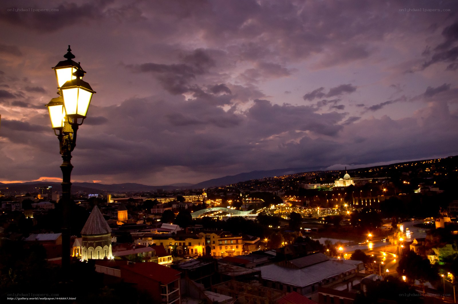 Twilight cityscape with street lamp