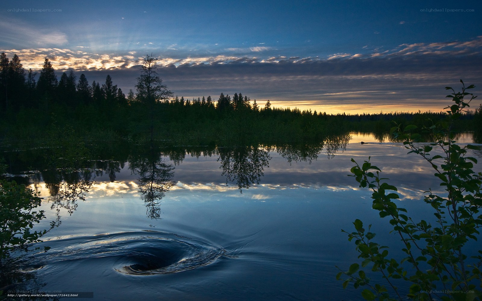 Twilight lake with swirling water