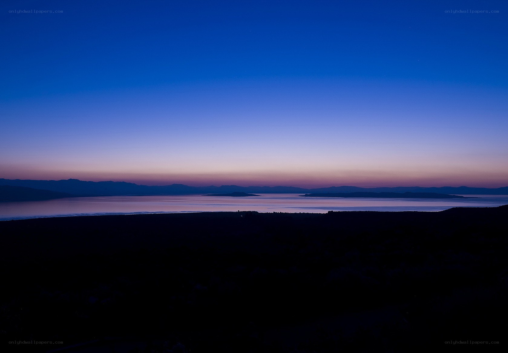 Twilight over a coastal landscape