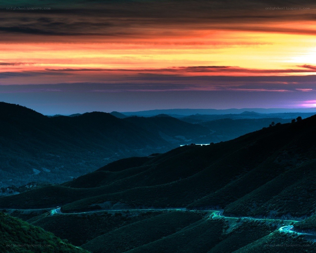 Twilight over rolling hills