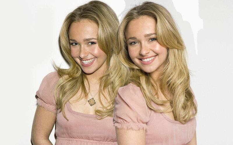 twin sisters smiling
