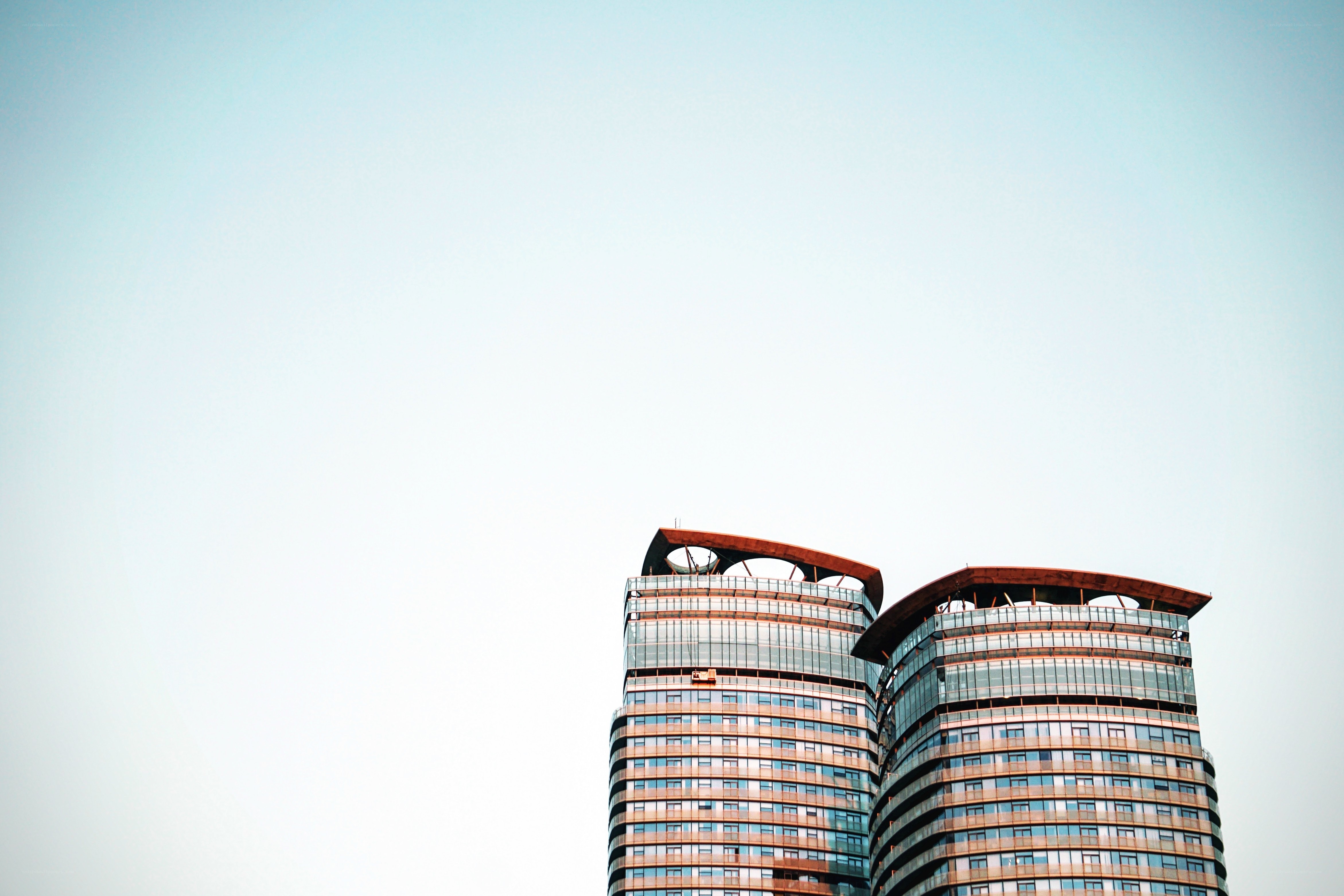 twin skyscrapers against sky