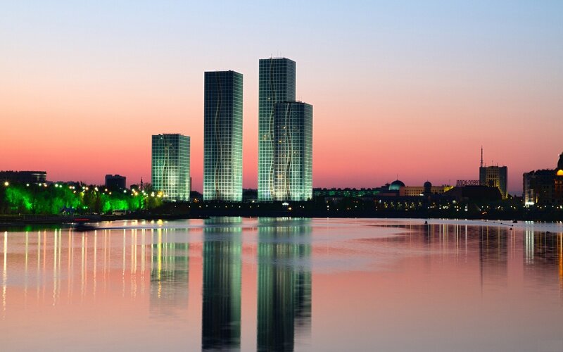 Twin Skyscrapers at Dusk — Pink, Serene, Sunset