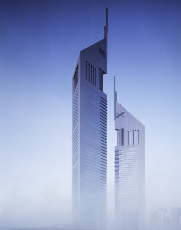 twin skyscrapers in fog