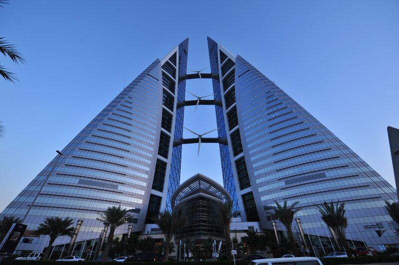 twin towers with wind turbines