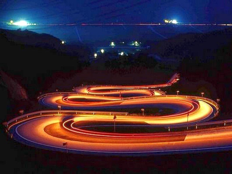 Twisting road at night