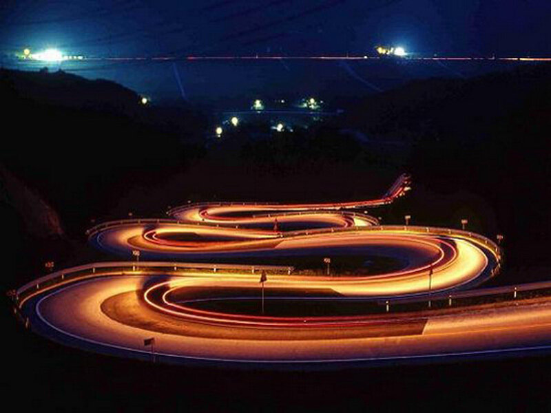 Twisting road at night