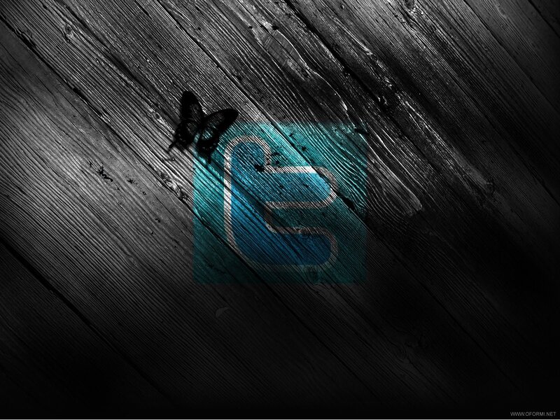 Twitter logo on wood texture