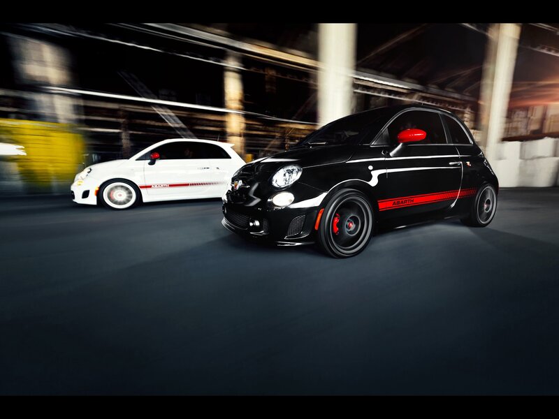 Two Abarth Fiat 500s in motion