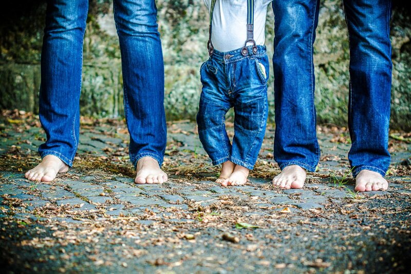 Two Adults and Child
