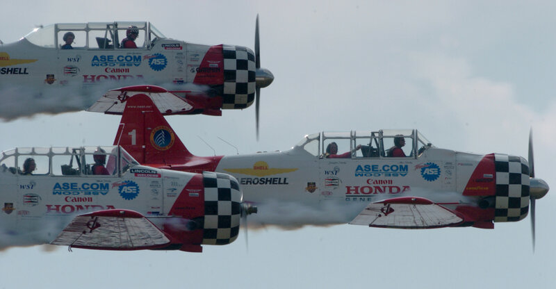 Two Aerobatic Planes — White