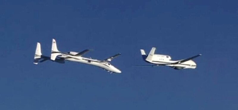Two Aircraft in Flight — Blue