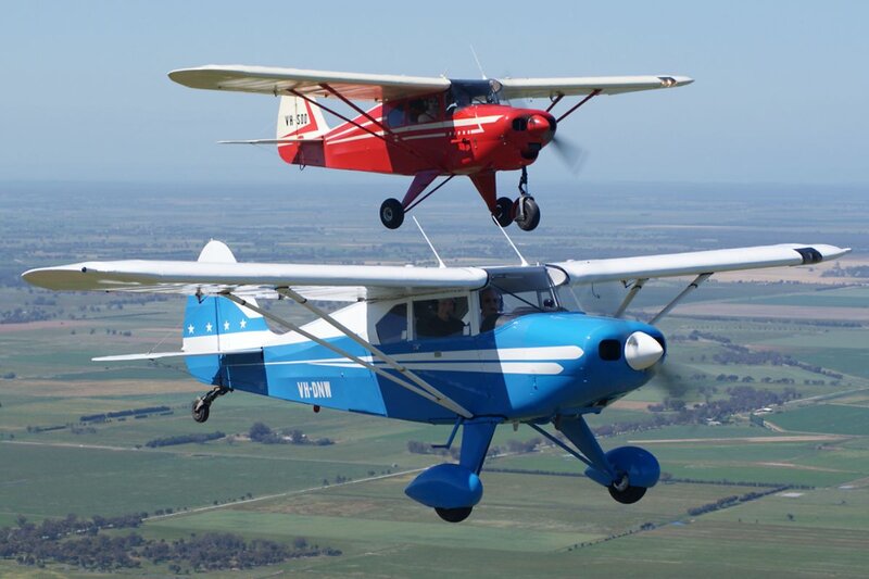 Two Airplanes in Flight — Blue